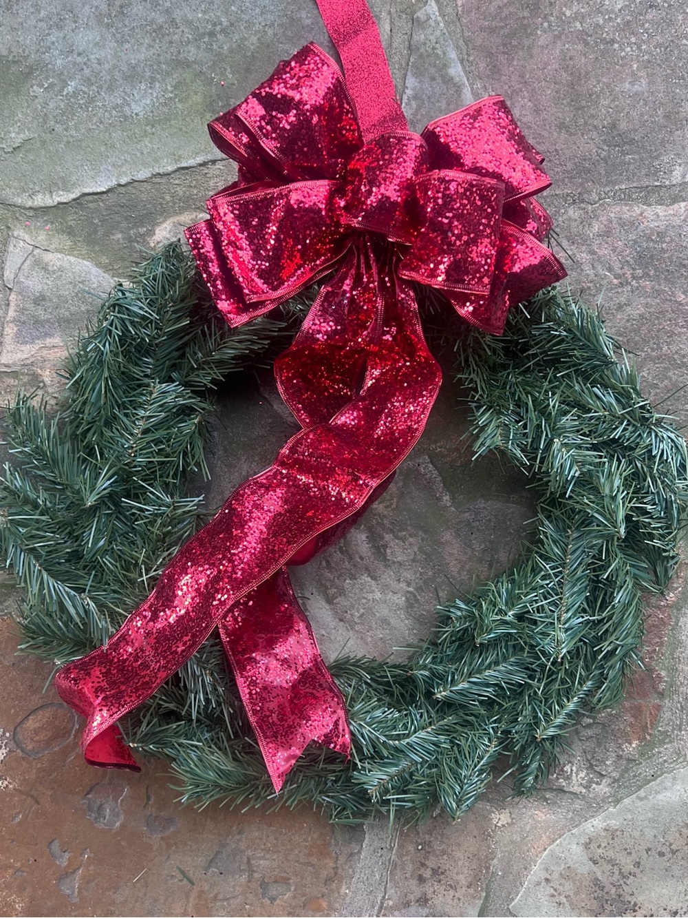 Festive Green Holiday Wreath with Sparkling Red Bow